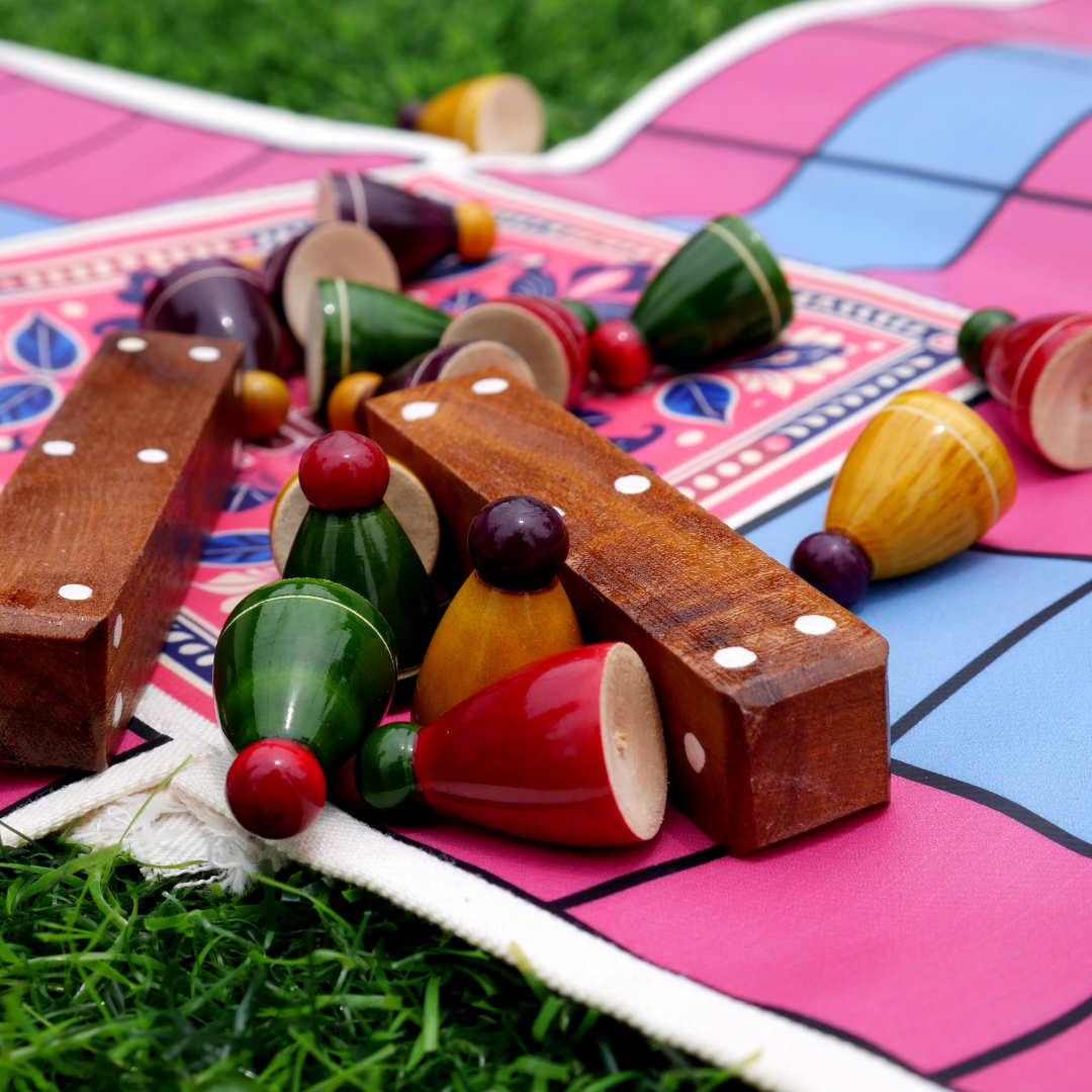 Colorful Pagade traditional Indian board game set by Roll the Dice, featuring four vibrant game boards for classic Pachisi gameplay.