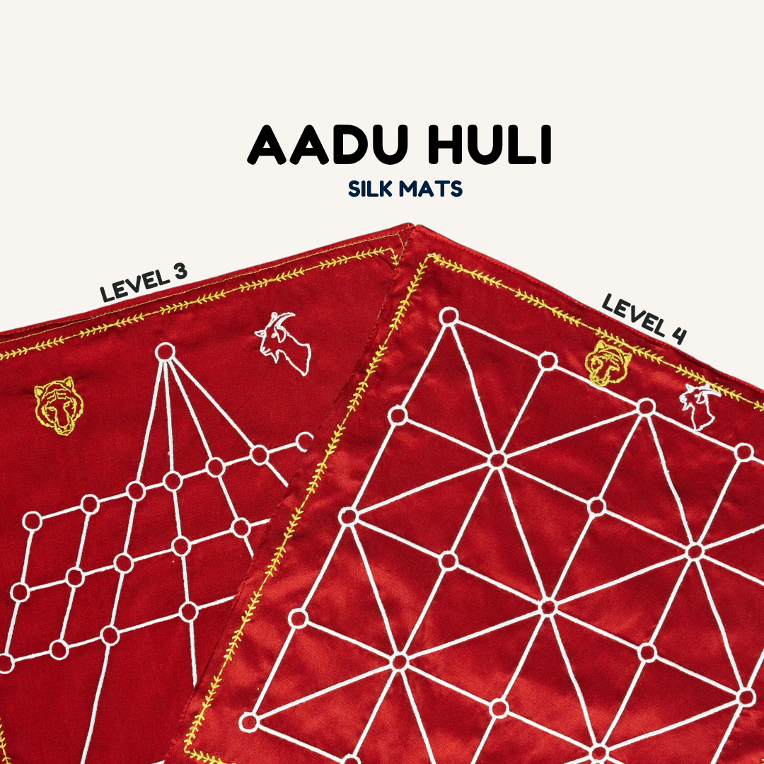 Heritage Aadu Huli board game with tiger and goat pieces, designed for 3 and 4 players by Roll the Dice.