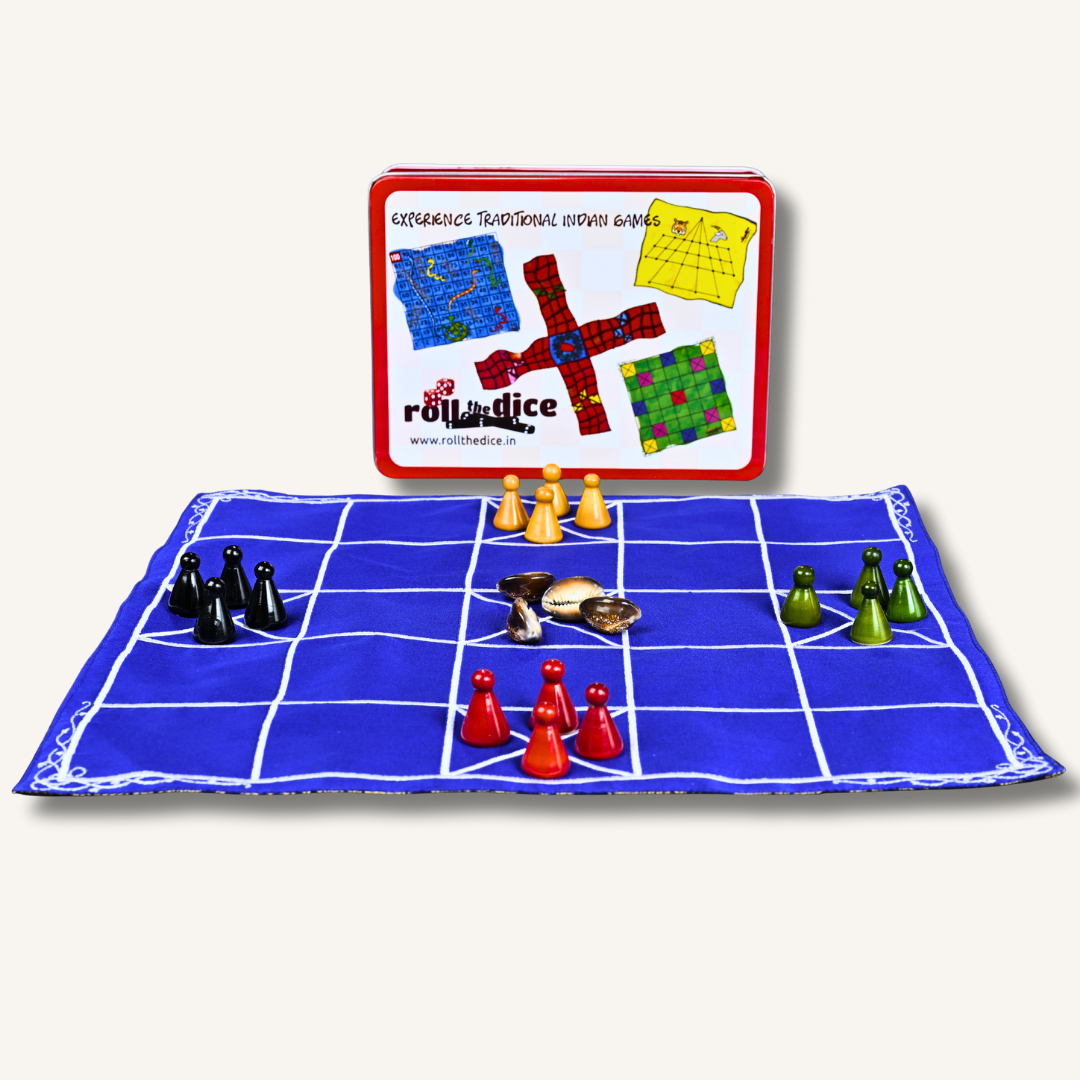 Traditional Indian Chowka Bara 5 House handcrafted board game by Roll the Dice, featuring colorful wooden pieces on a detailed game board.