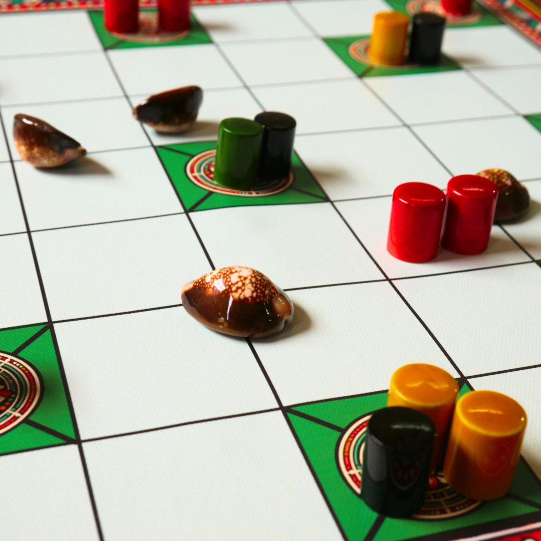Classic Chowka Bara board game set with durable mat, pawns, and house pieces from Roll the Dice, featuring 5 and 7 house options.