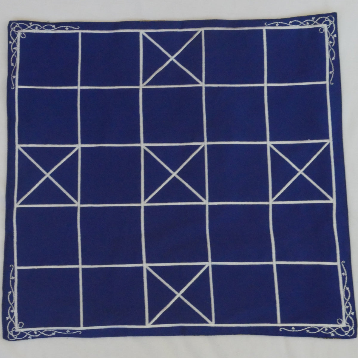 Chowka Bara 5 and 7 game mats from Roll the Dice, traditional game accessory with colorful designs on textured surface.