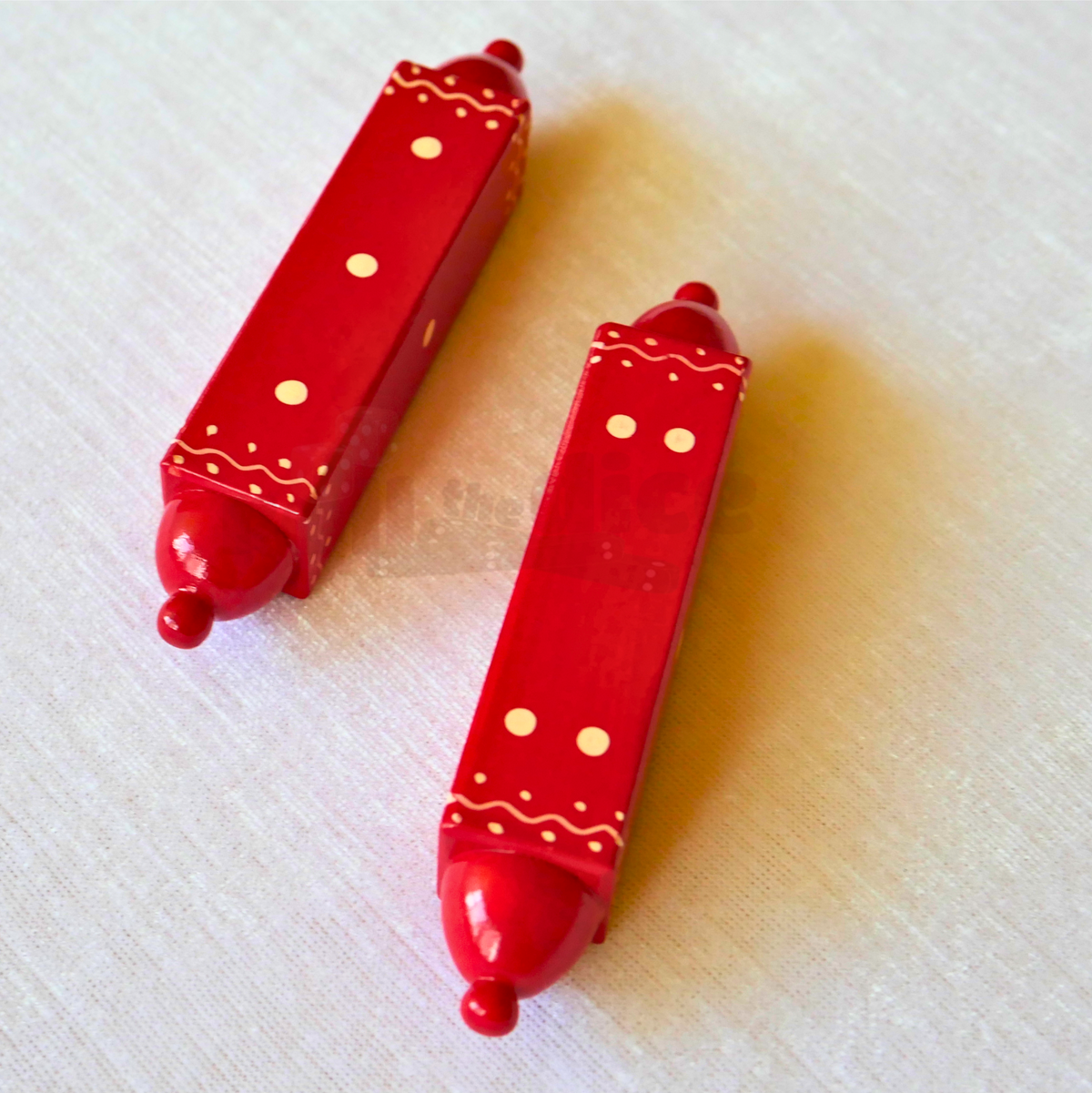 Red Special daaLa long dice by Roll the Dice, featuring a detailed close-up of the elongated gaming die.