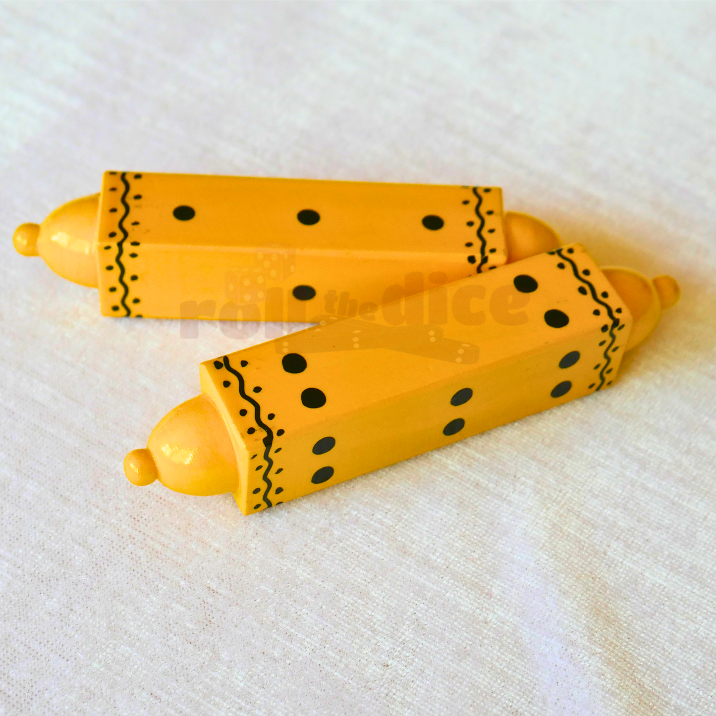 Yellow Special daaLa long dice by Roll the Dice, featuring a tall, rectangular shape with numbered sides for gaming and decision-making.