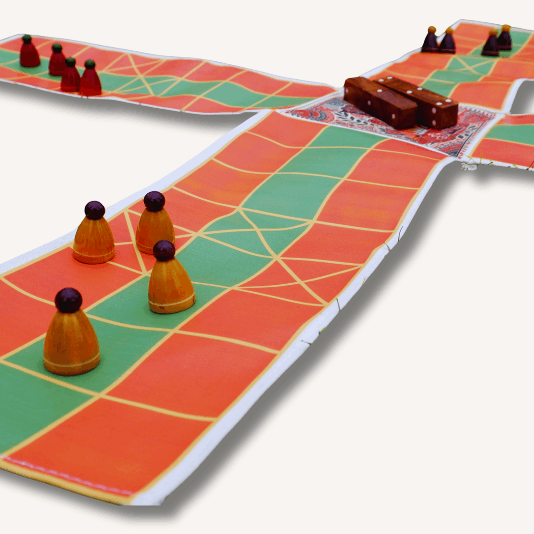 Colorful Pagade Indian board game set by Roll the Dice featuring traditional Pachisi design on a wooden game board.