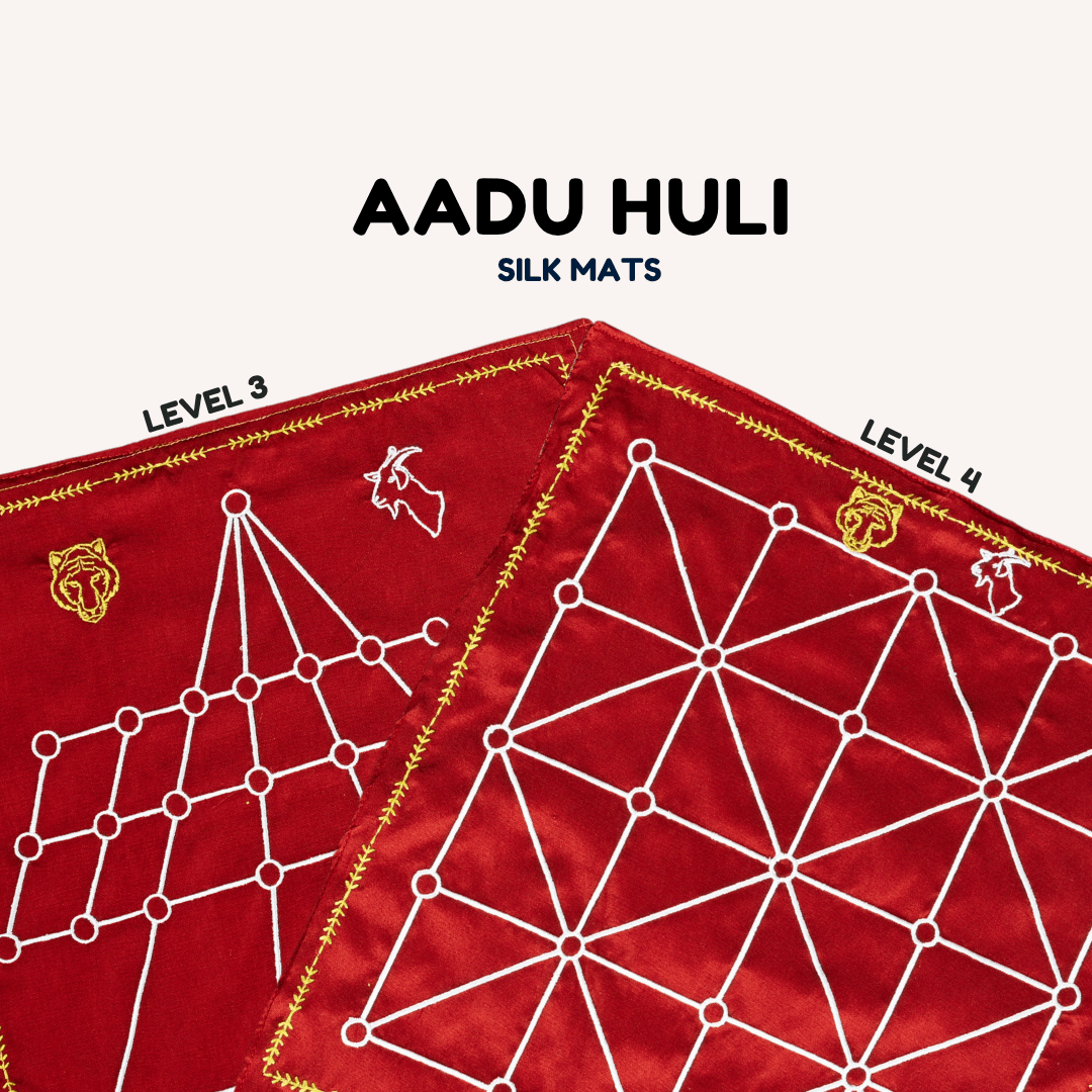 Heritage Aadu Huli board game with tiger and goat pieces, designed for 3 and 4 players by Roll the Dice.