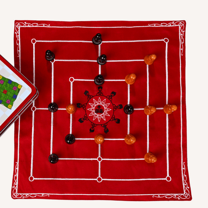 Heritage Navkankari board game by Roll the Dice, featuring traditional Indian motifs and colorful design on a wooden surface.