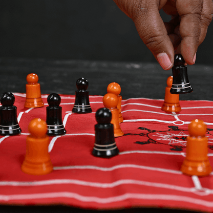 Heritage Navkankari board game by Roll the Dice, featuring traditional design and colorful game pieces on a wooden board.