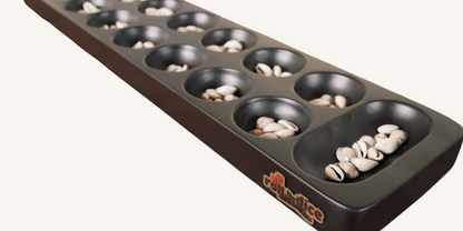 Satkoli board game by Roll the Dice featuring colorful game pieces and traditional design on a wooden game board.
