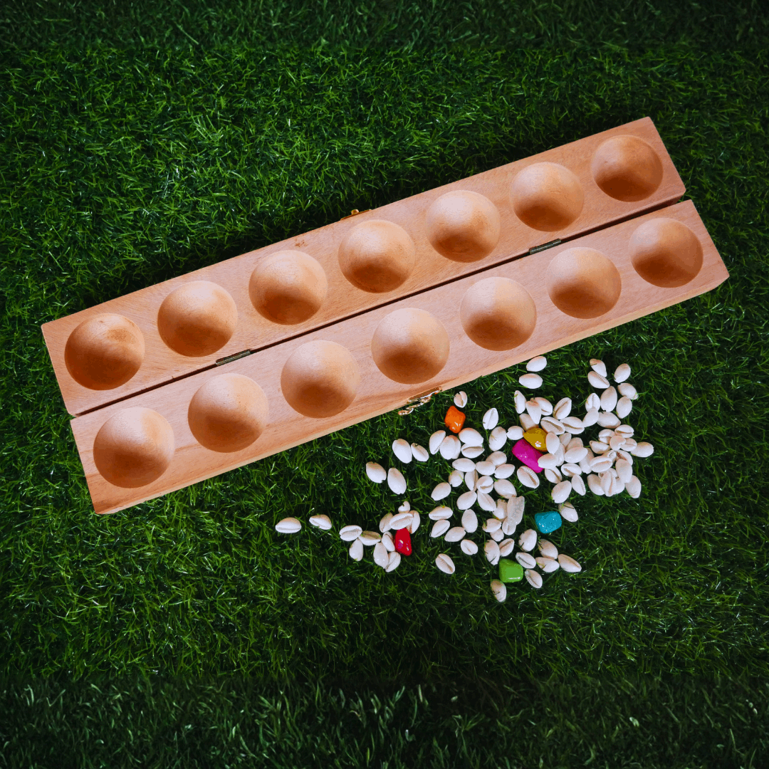 Mahogany wood Pallanguzhi board game with Alaguli Mane design, traditional Indian game for two players, by Roll the Dice.