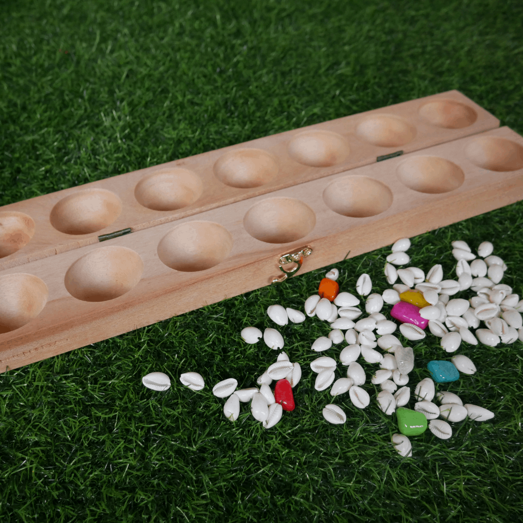 Mahogany wood Pallanguzhi board game with Alaguli Mane design by Roll the Dice, traditional Tamil family game for two players.