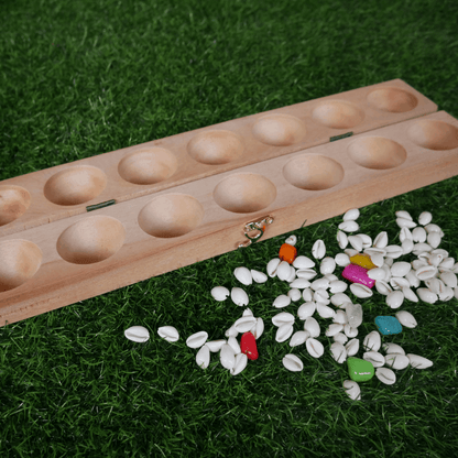 Mahogany wood Pallanguzhi board game with Alaguli Mane design by Roll the Dice, traditional Tamil family game for two players.