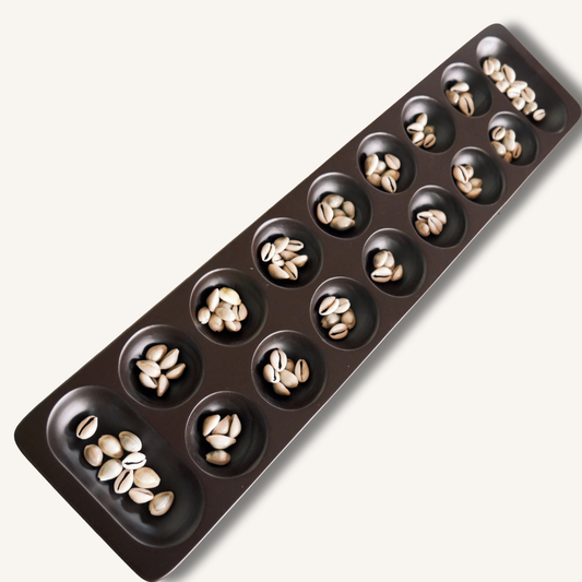 Pallanguzhi - பல்லாங்குழி