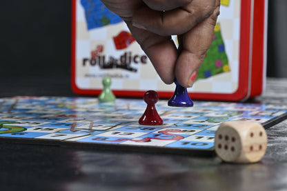 Roll the Dice Snake and Ludo board game set with colorful game pieces and dice, perfect for family fun and entertainment.