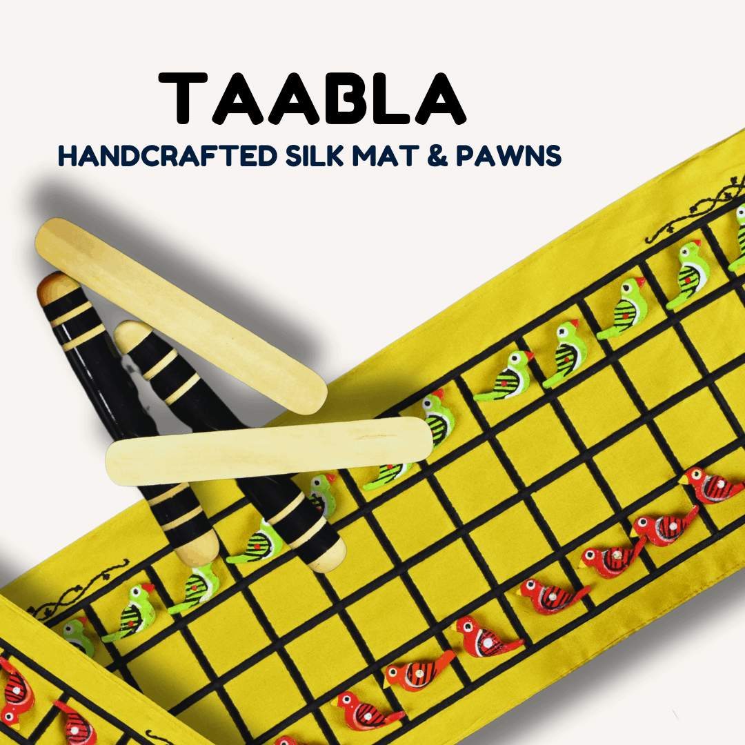 Traditional Taabla board game with wooden pieces and dice from Roll the Dice, featuring intricate design on a flat surface.