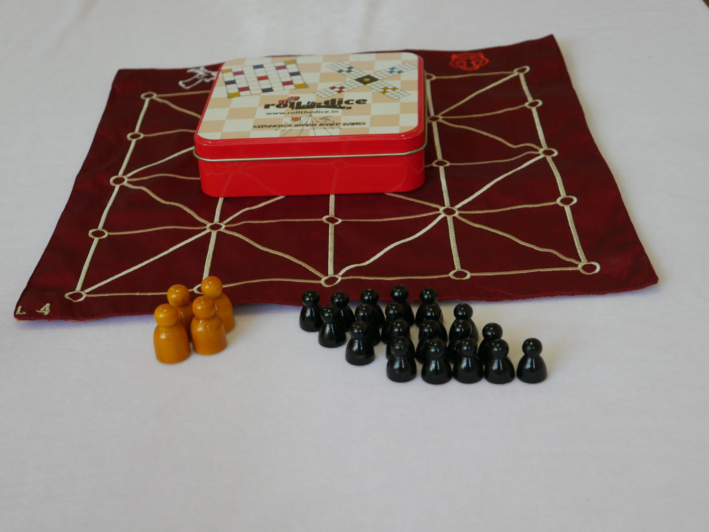 Indian traditonal board game - Tiger and goat hunting game, aadu puli aatam , puli jhoodam